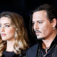 Illustration for article titled Johnny Depp, Accused of Domestic Abuse, Claims Amber Heard Painted On Her Bruises